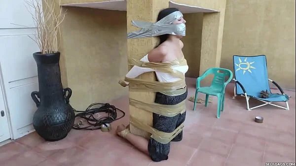 Christian Girl Duct Taped To Pillar And Gagged Tight